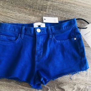 Bright blue designer shorts, size 25